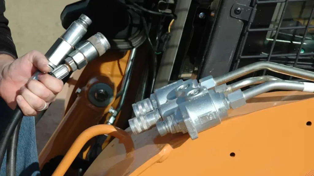 how to attach hydraulic hoses to skid steer