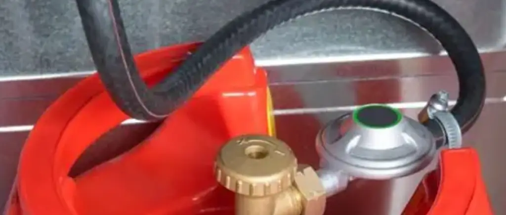 unclog a propane hose
