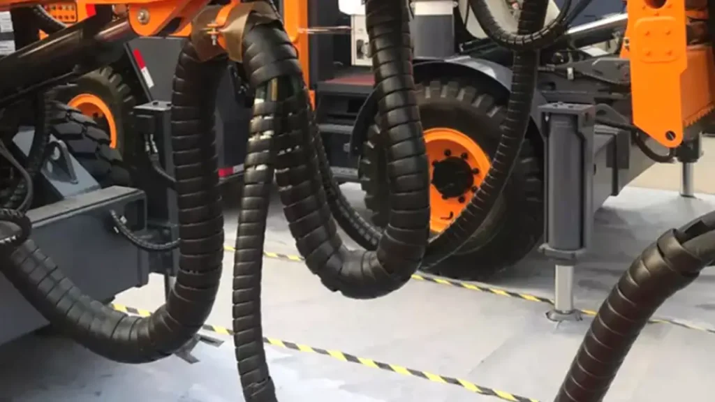 installing hydraulic hose wraps
